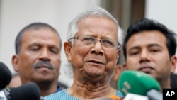 FILE - Nobel laureate Muhammad Yunus speaks to the media after he was granted bail by a court in an embezzlement case, in Dhaka, Bangladesh, March 3, 2024.