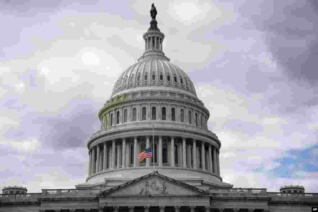 The American flag is lowered to half-staff over the US Capitol in Washington, Sept. 8, 2022.