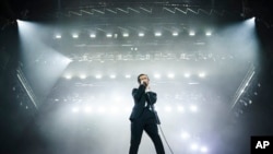 Matty Healy of The 1975 performs at the Reading Music Festival in Britain, Aug. 28, 2022. A music festival in Malaysia was canceled July 22, 2023, after Healy kissed a male band mate on stage.