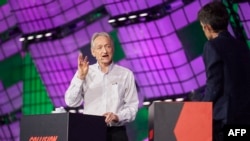 British-Canadian cognitive psychologist and computer scientist Geoffrey Hinton — known as the 'godfather of AI' — speaks with tech journalist and CEO of The Atlantic Nick Thompson, right, during the Collision Tech Conference in Toronto, June 28, 2023.