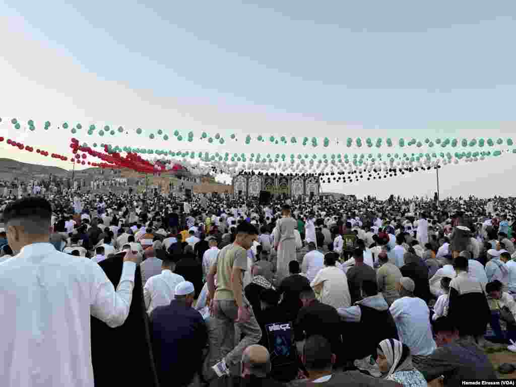 Just south of Cairo in Egypt's Western Desert, worshippers from villages around the pyramid complex come together among ancient burial grounds, many of them bearing in mind the hundreds of thousands of people in the besieged Gaza strip where hopes for a Ramadan cease-fire were dashed. Abusir, Egypt, April 10, 2024.