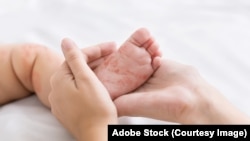 ILUSTRACIJA - Koža deteta obolelog od malih boginja.