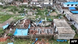 This aerial view shows damaged buildings after a tornado hit the city of Suqian, in China's eastern Jiangsu province, Sept. 20, 2023. 