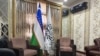 Uzbekistan and the Taliban flags side by side inside the Afghan Consulate in Termez, Uzbekistan, even though outside the compound still keeps the flag of the Islamic Republic of Afghanistan. Aug. 10, 2023. 