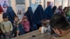 Afghan women and children refugees deported from Pakistan wait in a nutrition ward at the United Nations High Commissioner for Refugees camp on the outskirts of Kabul, Afghanistan, Jan. 9, 2024.