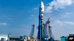 In this photo released by Roscosmos State Space Corporation, the Soyuz-2.1b rocket with the moon lander Luna-25 automatic station is set at a launch pad at the Vostochny Cosmodrome in the Russian Far East, Aug. 8, 2023.