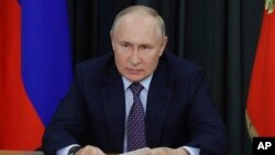 Ruski predsjednik Vladimir Putin na sastanku u Moskvi (Foto: Mikhail Klimentyev, Sputnik, Kremlin Pool via AP)