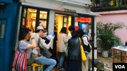 Mount Zero, one of the most popular independent bookstores in Hong Kong, will close at the end of March. It has hosted talks by politically outspoken authors. It announced its closure after it was warned it must correct minor violations. (Cindy Sui/VOA)