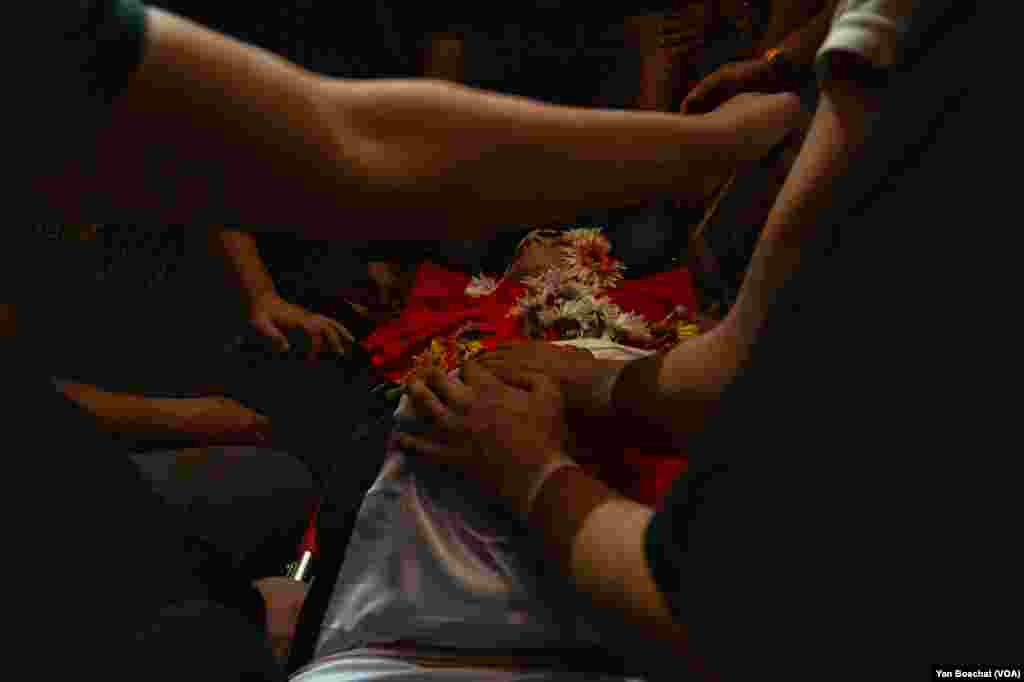 The body of Ahmad Ghaleb, 16, is taken to the mosque in the Qalandia Refugee Camp for prayers before his funeral, in Qalandia Refugee Camp, Oct. 25, 2023. 