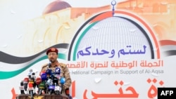 FILE - Huthi military spokesman Yahya Saree is shown in the Yemeni capital of Sanaa on Dec. 15, 2023. Saree said in a televised statement that rockets and drones had been launched attacking British, U.S. and Israeli ships. 