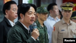 FILE - Taiwan President Lai Ching-te speaks during his visit to a military camp in Taoyuan, Taiwan, May 23, 2024.