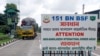 FILE - Border Security Force (BSF) personnel inspect a truck carrying supplies to Bangladesh at the India-Bangladesh border in Fulbari on the outskirts of Siliguri, Aug. 7, 2024