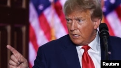 FILE - Former U.S, President Donald Trump delivers remarks during an event following his arraignment on classified document charges, at Trump National Golf Club, in Bedminster, New Jersey, June 13, 2023.