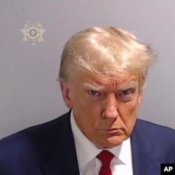 This booking photo provided by the Fulton County Sheriff's Office shows former President Donald Trump on Aug. 24, 2023, after he surrendered and was booked at the Fulton County Jail in Atlanta.