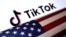 FILE - U.S. flag is placed on a TikTok logo in this illustration taken March 20, 2024.