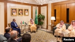 FILE - Saudi Foreign Minister Prince Faisal bin Farhan meets with his Syrian counterpart Faisal Mekdad, in Riyadh, Saudi Arabia, March 14, 2024. (Saudi Press Agency/Handout via Reuters) Riyadh on Sunday appointed its first ambassador to Damascus in over a decade.