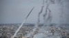 Rockets are launched by Palestinian militants from the Gaza Strip towards Israel on Oct. 7, 2023.