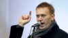 FILE - Alexey Navalny speaks during a rally in Moscow, Dec. 24, 2011. 