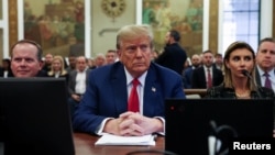 Former U.S. President Donald Trump, with lawyers Christopher Kise, left, and Alina Habba, attends the closing arguments in the Trump Organization civil fraud trial at New York State Supreme Court in New York, Jan. 11, 2024.