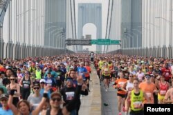 A general view of runners crossing the Verrazzano-Narrows Bridge during the New York City Marathon, Nov. 5, 2023.
