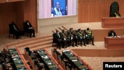 FILE - Zimbabwe's President Emmerson Mnangagwa delivers his State of the Nation Address (SONA) at the parliament building in Harare, Zimbabwe, November 23, 2022.