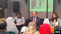 FILE - Peter Haas, the U.S. ambassador to Bangladesh, meets with families of alleged victims of enforced disappearance, in Dhaka, Dec. 14, 2022. Haas is popular in Bangladesh among pro-democracy and rights activists and critics of the Sheikh Hasina regime. (Emdadul Haque for VOA)