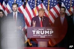 Republican presidential candidate former President Donald Trump speaks at a caucus night party in Des Moines, Iowa, Jan. 15, 2024.
