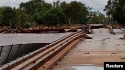 A bridge damaged by heavy flooding, in Fitzroy Crossing, Australia, Jan. 7, 2023. (Joe Ross via Reuters)