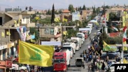 Tankers carrying Iranian fuel arrive at al-Ain in Hermel in east Lebanon's Bekaa Valley on September 16, 2021. Dozens of tankers carrying Iranian fuel and transported by the Shiite Hezbollah movement arrived from Syria in Lebanon. (AFP)