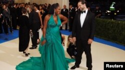 Serena Williams and Alexis Ohanian arrive, May 1, 2017, at the Metropolitan Museum of Art Costume Institute Gala in New York.