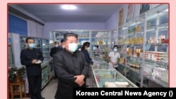 North Korean leader Kim Jong Un during an on-site inspection of local pharmacy, May 15, 2022. Photo: Korean Central News Agency
