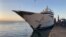 FILE - This handout photo courtesy of the U.S. Department of Justice released on May 5, 2022 shows the Amadea yacht owned by sanctioned Russian oligarch Suleiman Kerimov docked in Lautoka, Fiji. (U.S. Department of Justice via AFP)