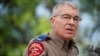 Texas Department of Public Safety Director Steven McCraw speaks at Robb Elementary School, May 27, 2022, in Uvalde, Texas. He said police responding to the shooting at Robb stayed out of a classroom where the shooter was because they believed students were no longer at risk. 