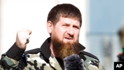 FILE - Ramzan Kadyrov, leader of the Russian province of Chechnya, speaks in Chechnya's regional capital of Grozny, Russia, March 29, 2022. 