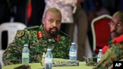 FILE - Then-Lt. Gen. Muhoozi Kainerugaba, son of Uganda's President Yoweri Museveni, attends a ceremony in Entebbe, Uganda, May 7, 2022.