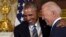 FILE - President Barack Obama laughs with Vice President Joe Biden during a ceremony in the State Dining Room of the White House in Washington, Jan. 12, 2017. 