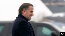Hunter Biden, son of U.S. President Joe Biden, boards Air Force One with his father, Feb. 4, 2023, in Syracuse, New York. Former Twitter executives said Wednesday they made a mistake by blocking a story about Hunter Biden before the 2020 election.