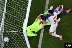 Gol Kristijana Pulišića na meču sa Iranom (Foto: AFP/Kirill Kudryavtsev)