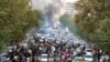 FILE - Protesters chant slogans during a protest over the death of a woman who was detained by the morality police, in downtown Tehran, Iran, Sept. 21, 2022, in this photo taken by an individual not employed by the Associated Press and obtained by the AP 