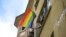 FILE - A woman waves a rainbow flag as she shouts slogans during the LGBTQ Pride March in Istanbul, Turkey, June 26, 2022. 