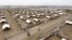 An aerial view shows recently constructed houses at the Kakuma refugee camp in Turkana District, northwest of Kenya's capital Nairobi, June 20, 2015. Conditions at Kenya's Kalobeyei refugee complex have improved after residents complained.