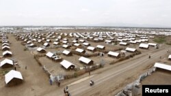 FILE - An aerial view shows houses at the Kakuma refugee camp in Turkana District, northwest of Kenya's capital Nairobi, June 20, 2015. A malaria outbreak in the nearby Kalobeyei refugee complex has killed at least 4 people.