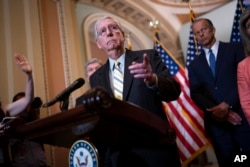 Senate Minority Leader Mitch McConnell, R-Ky., speaks with reporters following a closed-door caucus lunch, at the Capitol in Washington, June 22, 2022.