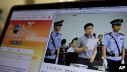 A photo described as the trial showing human rights lawyer Xie Yang which is seen on the social media of the Changshai Intermediate People's Court is displayed on a computer in Beijing, China, May 8, 2017.