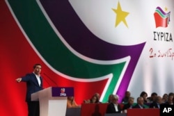 Greek Prime Minister Alexis Tsipras delivers his speech during his party congress in Athens, Oct. 13, 2016.