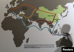 FILE - Map illustrating China's "One Belt, One Road" megaproject at the Asian Financial Forum in Hong Kong, Jan. 18, 2016.