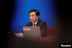 Zhang Yesui, a spokesman for National People's Congress (NPC), addresses reporters ahead of China's annual session of parliament at the Great Hall of the People in Beijing, China, March 4, 2018.