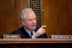 FILE - Sen. Chris Van Hollen, D-Md., questions a witness on Capitol Hill in Washington, Jan. 16, 2019.