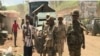 FILE - Cameroon troops watch for separatists in Cameroon's northwest region, Bamenda, Cameroon, May 24, 2019. Anglophone separatists reportedly attacked Bamenda on Tuesday, after a military tribunal gave their leader and 9 supporters life sentences. 