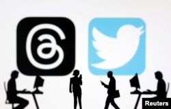 Logo Threads dan plikasi Twitter terlihat dalam ilustrasi yang diambil, 6 Juli 2023. (Foto: REUTERS/Dado Ruvic)